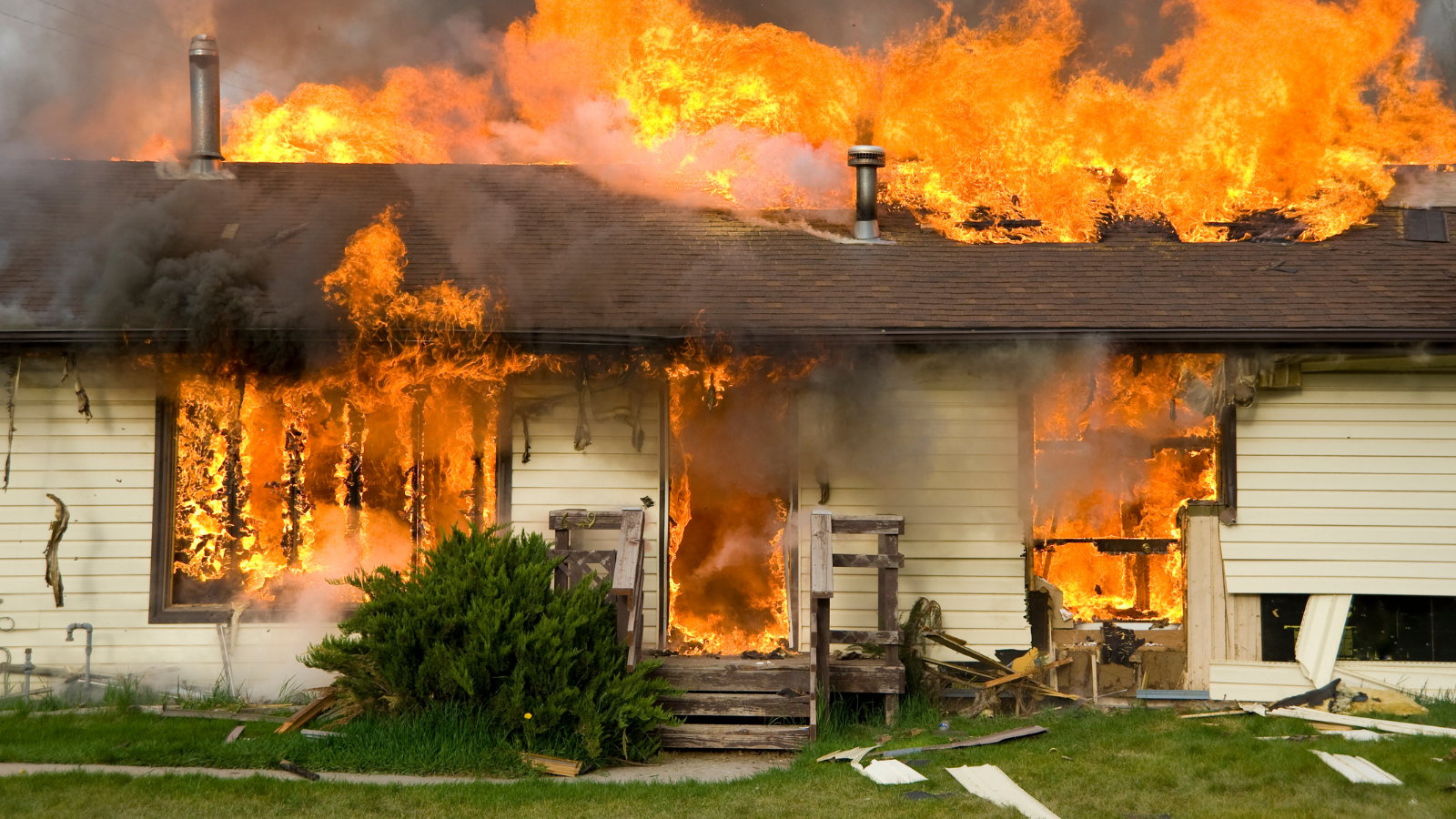 A one-story house that has become a raging inferno.