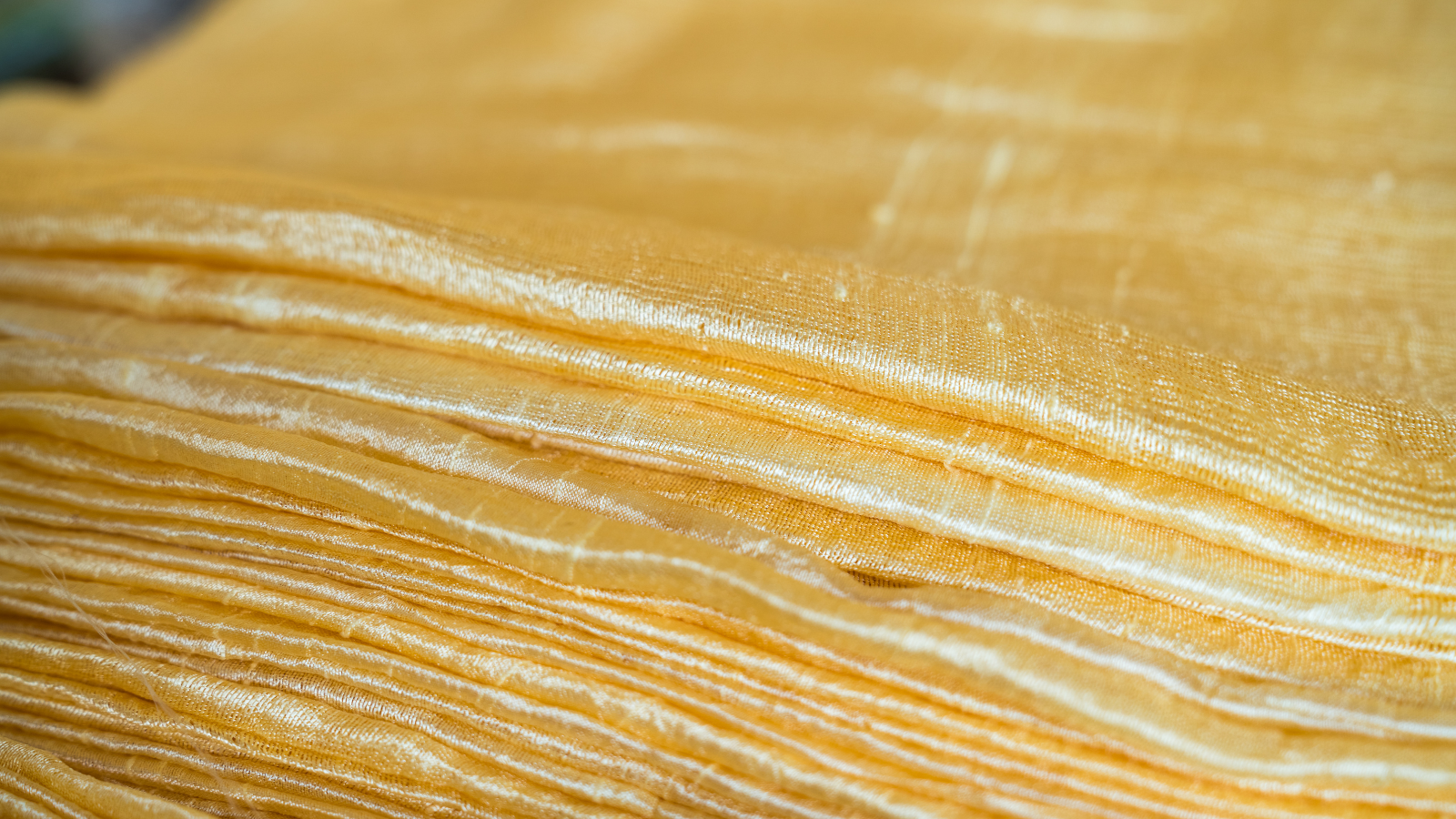 Layers of naturally woven yellow-gold silk.