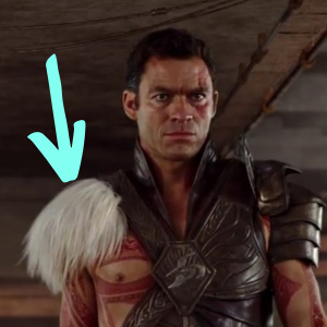 Sab Than from John Carter, with an arrow pointing to the white fur on his shoulder.